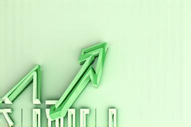 A graph showing a downward trend, representing reduced interest rates with a green monetary symbol overlay.