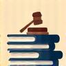 Stack of law books with a gavel, representing legal compliance